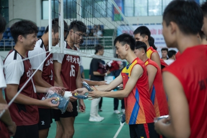 Gift exchange between players of both teams.