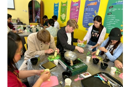 Students make banana soup from immature fallen bananas, putting “whole-food utilization” into practice.