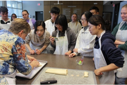The Taiwan Youth Exchange program got instructions and hands-on experience shaping dough from the experts in the Kansas Wheat Innovation Center at Kansas Wheat in Manhattan, Kan. 