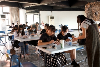 Students making felt with dog fur