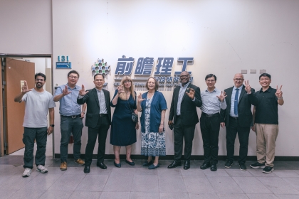 The delegation visited NCHU iCAST, hosted by Deputy Director Dr. K-Y Lin (third from right), and observed an international summer program on semiconductor hands-on training.