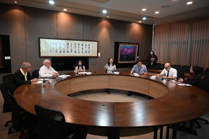 Briefings and exchanges with representatives from NCHU Affiliated High School